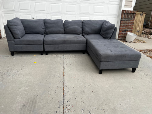 Grey 4-piece modular sectional with tufted ottoman, photo 1