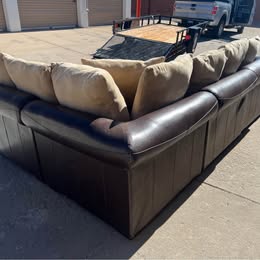 Leather Modular Sectional with Beige Cushions