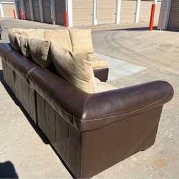 Leather Modular Sectional with Beige Cushions