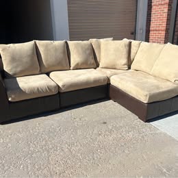 Leather Modular Sectional with Beige Cushions