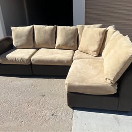 Leather Modular Sectional with Beige Cushions