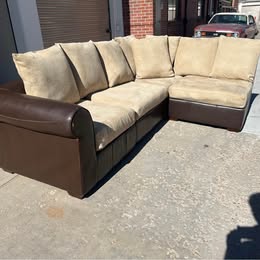 Leather Modular Sectional with Beige Cushions