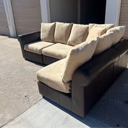 Leather Modular Sectional with Beige Cushions