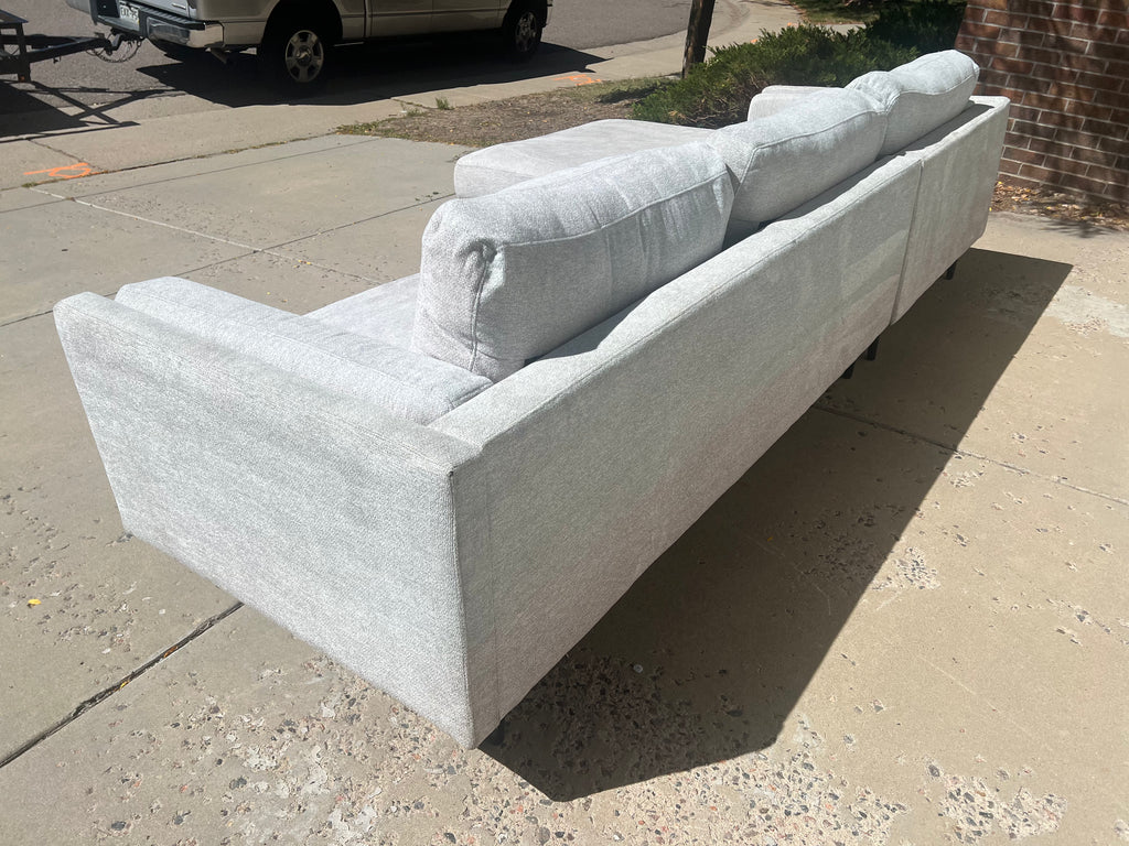 Light Grey Living Spaces Sectional with Chaise