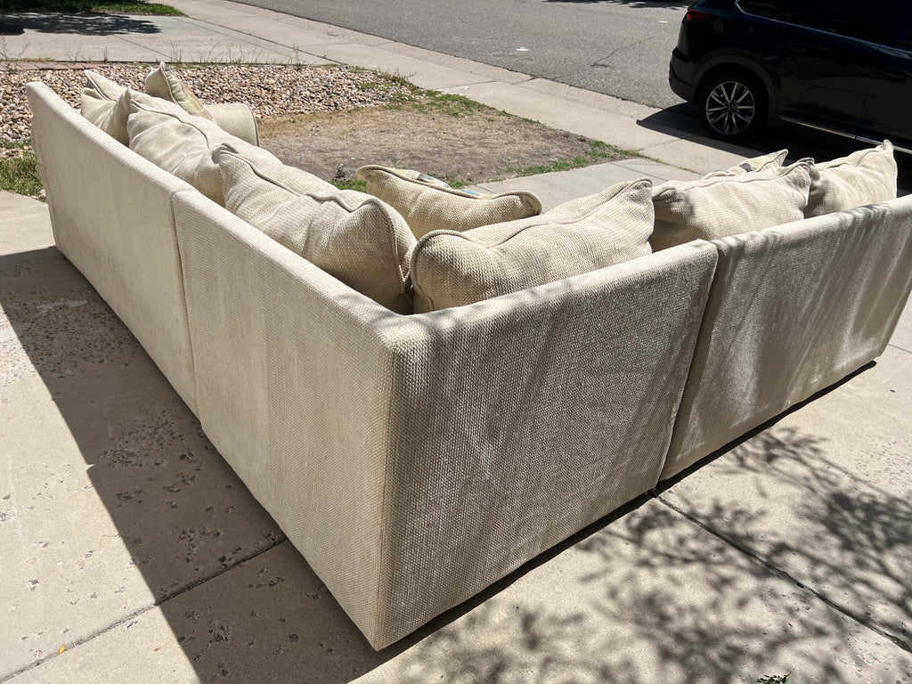 Large Beige L-Shaped Comfy Sectional with Throw Pillows