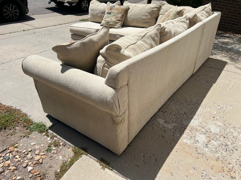 Large Beige L-Shaped Comfy Sectional with Throw Pillows
