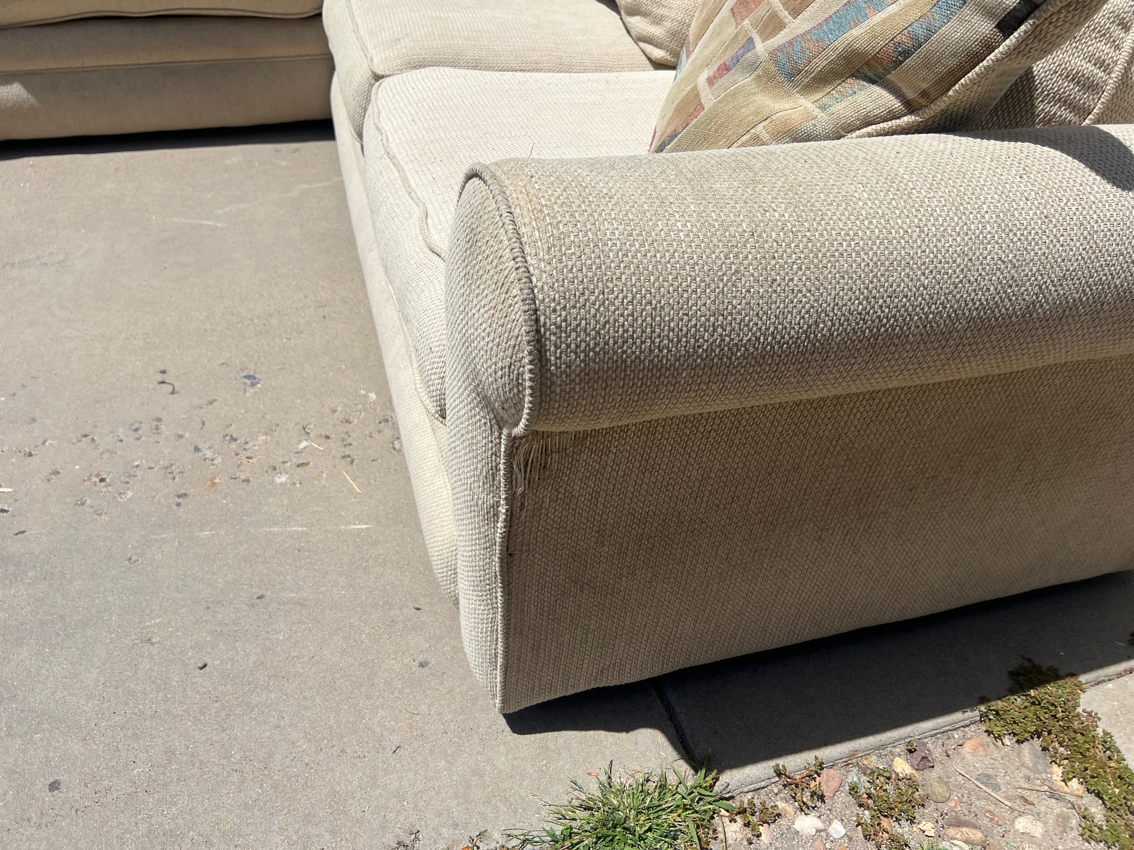 Large Beige L-Shaped Comfy Sectional with Throw Pillows