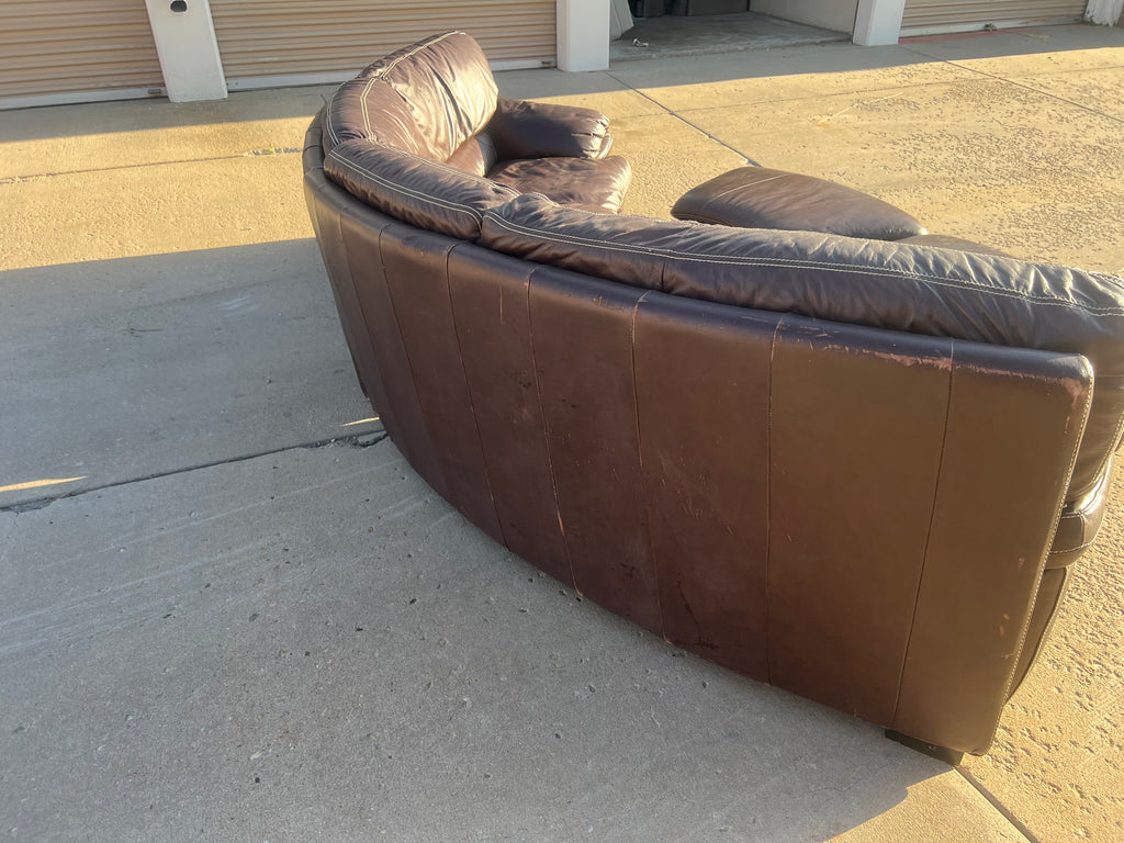 Curved Leather Sectional with 2 Storage Ottomans