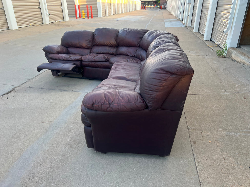 Leather L Shaped Reclining Sectional with Hide-a-bed.