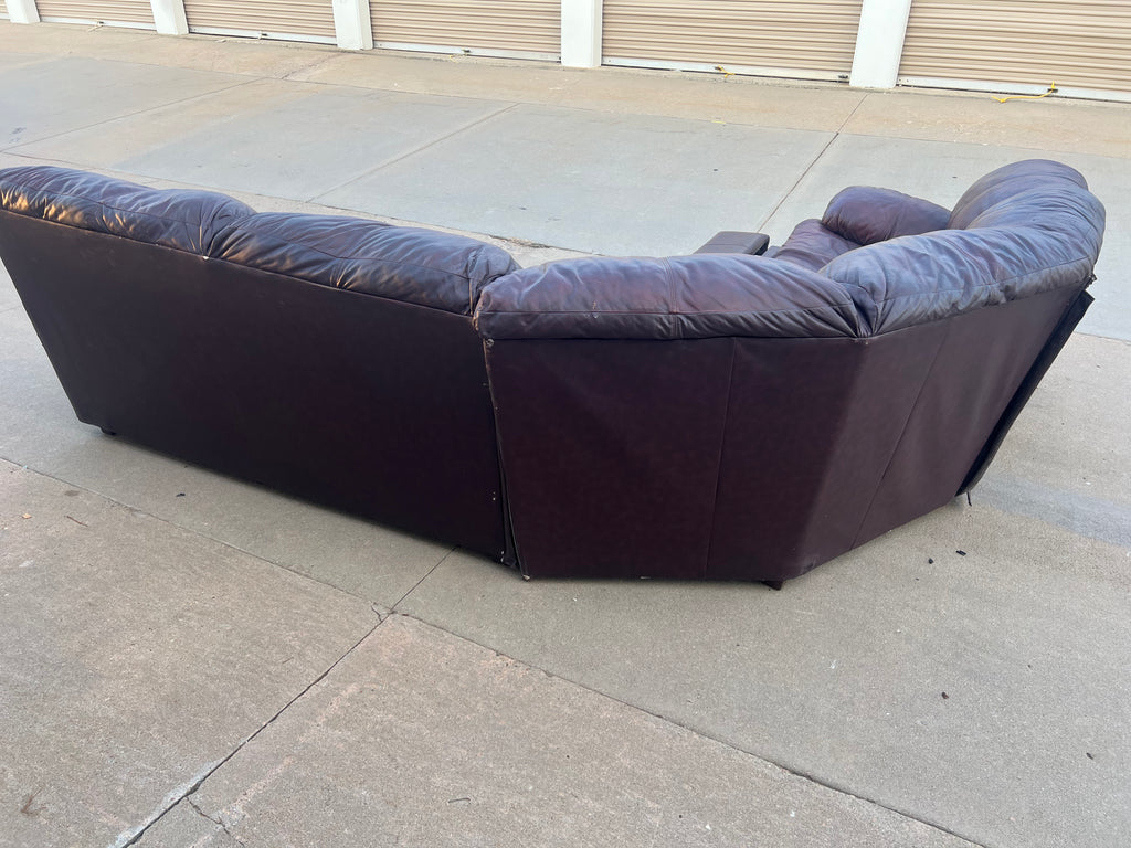 Leather L Shaped Reclining Sectional with Hide-a-bed.