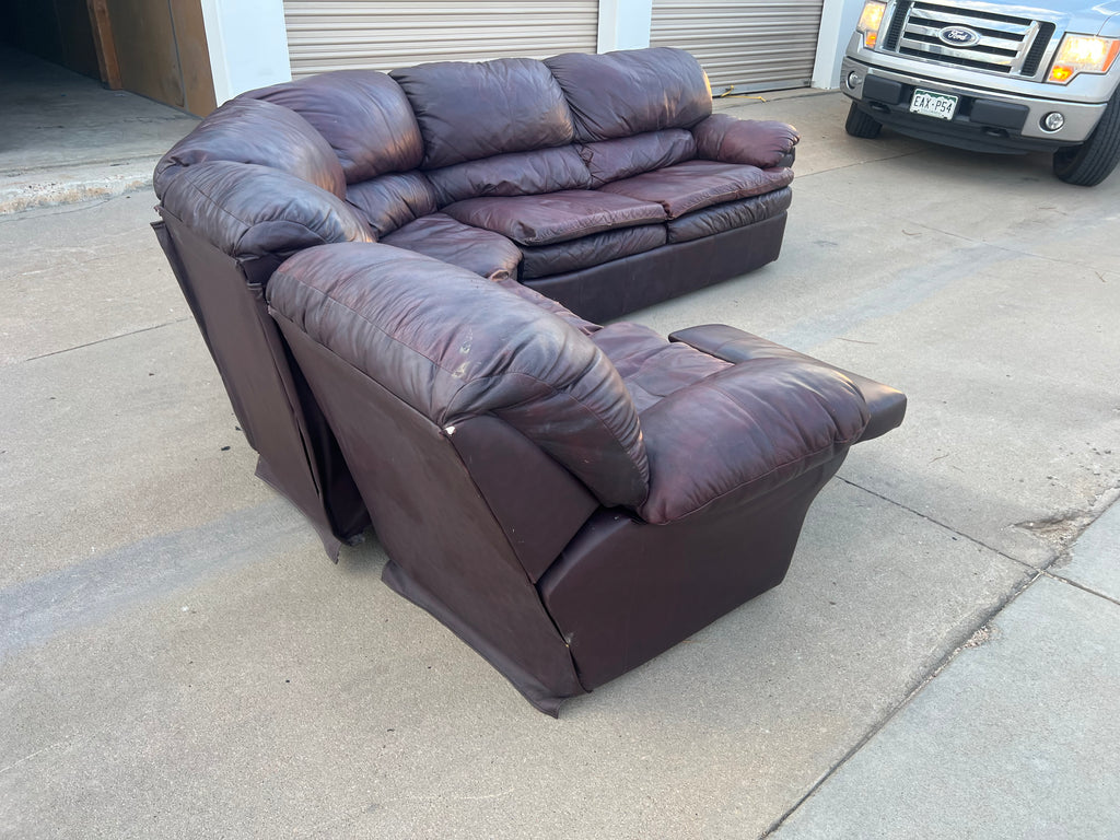 Leather L Shaped Reclining Sectional with Hide-a-bed.
