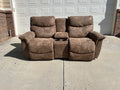 Brown Power Reclining Loveseat with Cupholders and Storage