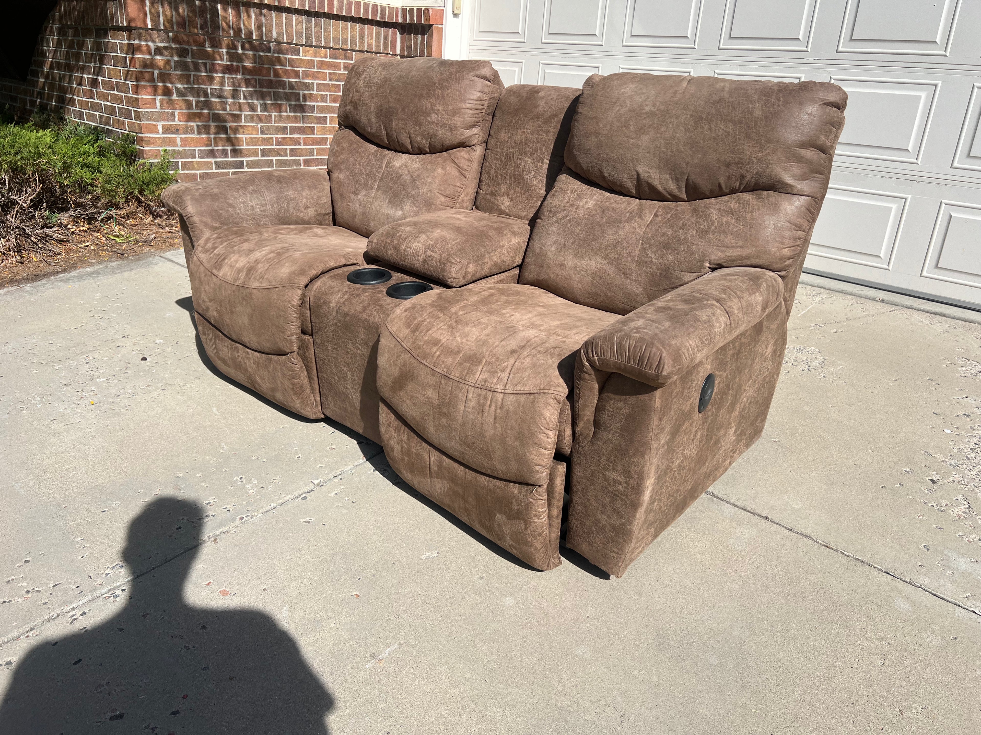 Brown Power Reclining Loveseat with Cupholders and Storage