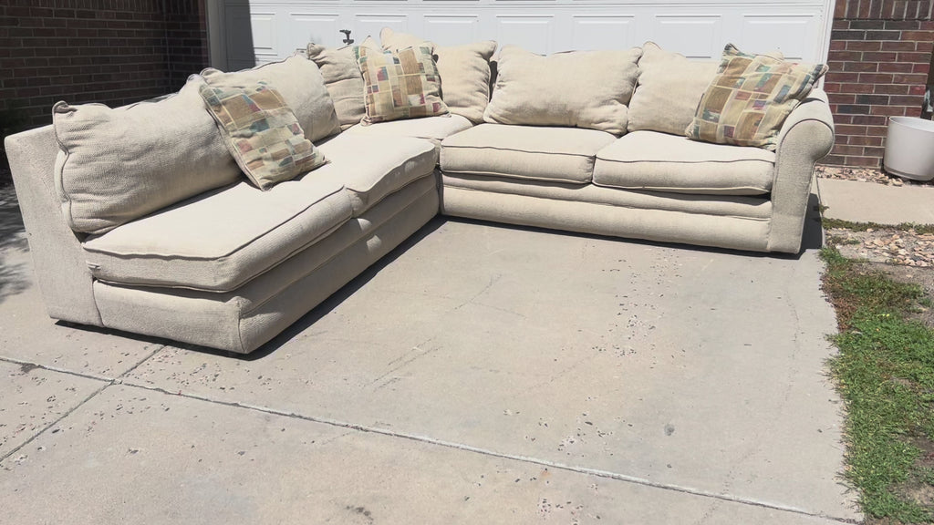 Large Beige L-Shaped Comfy Sectional with Throw Pillows