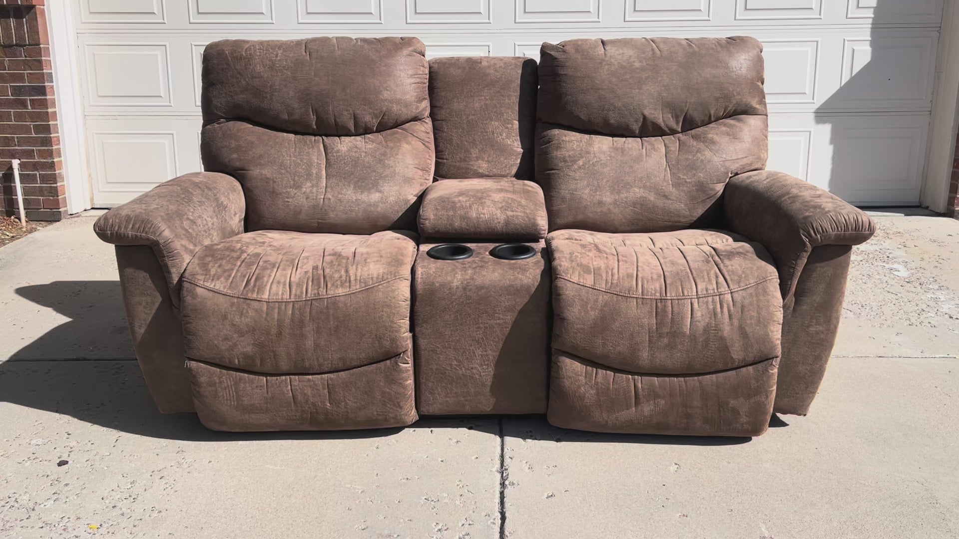 Brown Power Reclining Loveseat with Cupholders and Storage